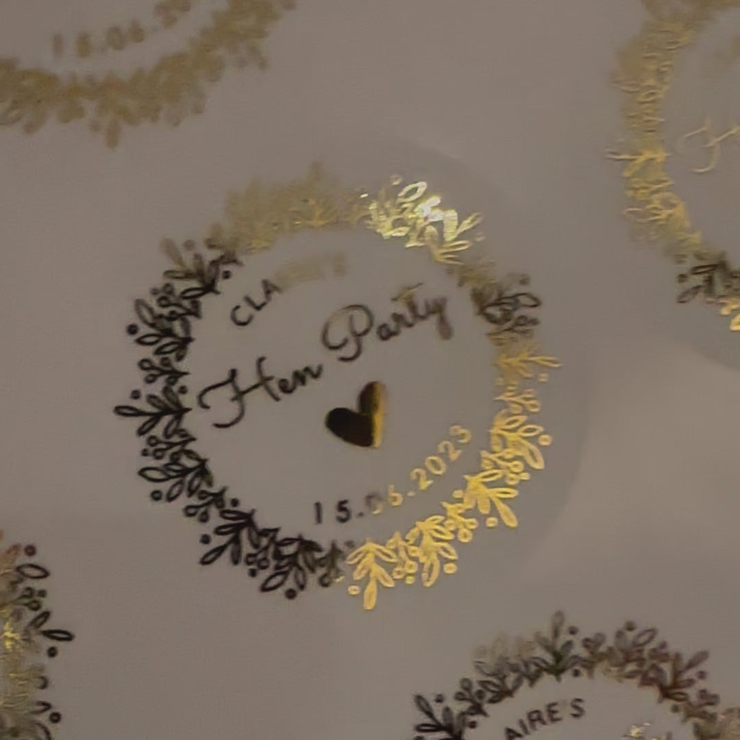Load video: Personalised Hen Party Stickers moving to show the high shine gold foil finish