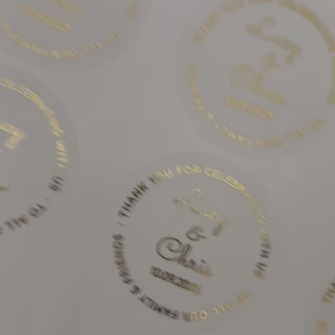 Load video: Personalised Wedding Favour Stickers with names moving to show the high shine gold foil finish