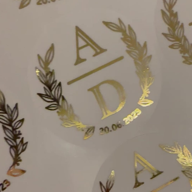 Personalised Initial Monogram Wedding Stickers moving to show the high shine gold foil finish