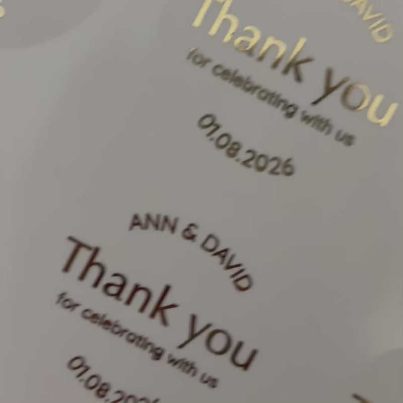 Personalised 'thank you for celebrating with us'' Wedding Stickers with names and date moving to show the high shine gold foil finish